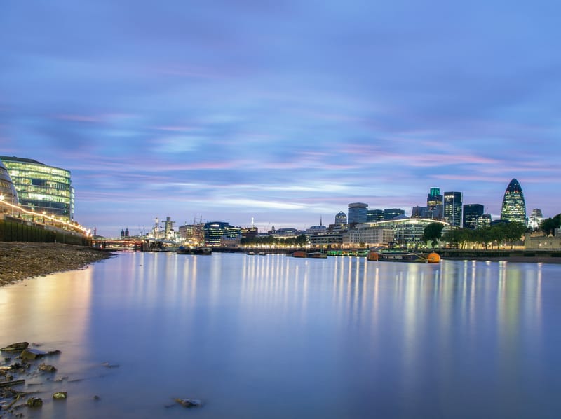 The Thames at dawn from the foreshore, City Hall and the Gherkin on the far bank